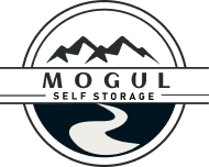 Here's an alt tag for the image: Mogul Self Storage logo with mountains.